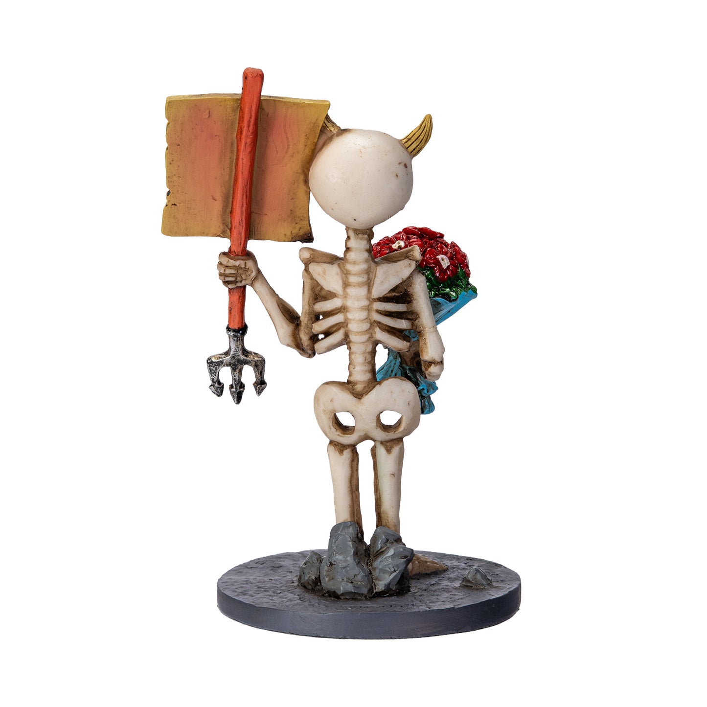 Back view of skeleton figurine showing sign and detailed bone structure
