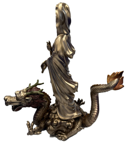 Left side view of Kuan Yin figurine with dragon base highlighting sculpted details and cold cast bronze finish
