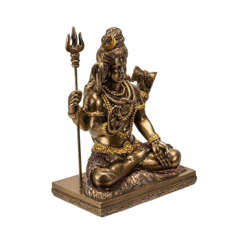 Angled view of Shiva statue highlighting trident and intricate craftsmanship
