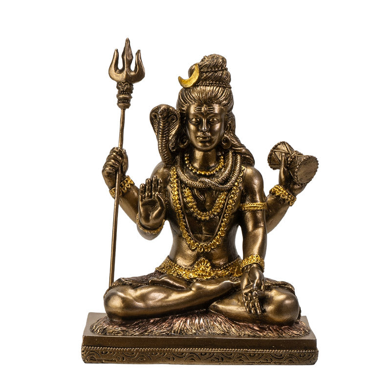 Front view of Lord Shiva statue in meditative pose with trident and detailed ornaments
