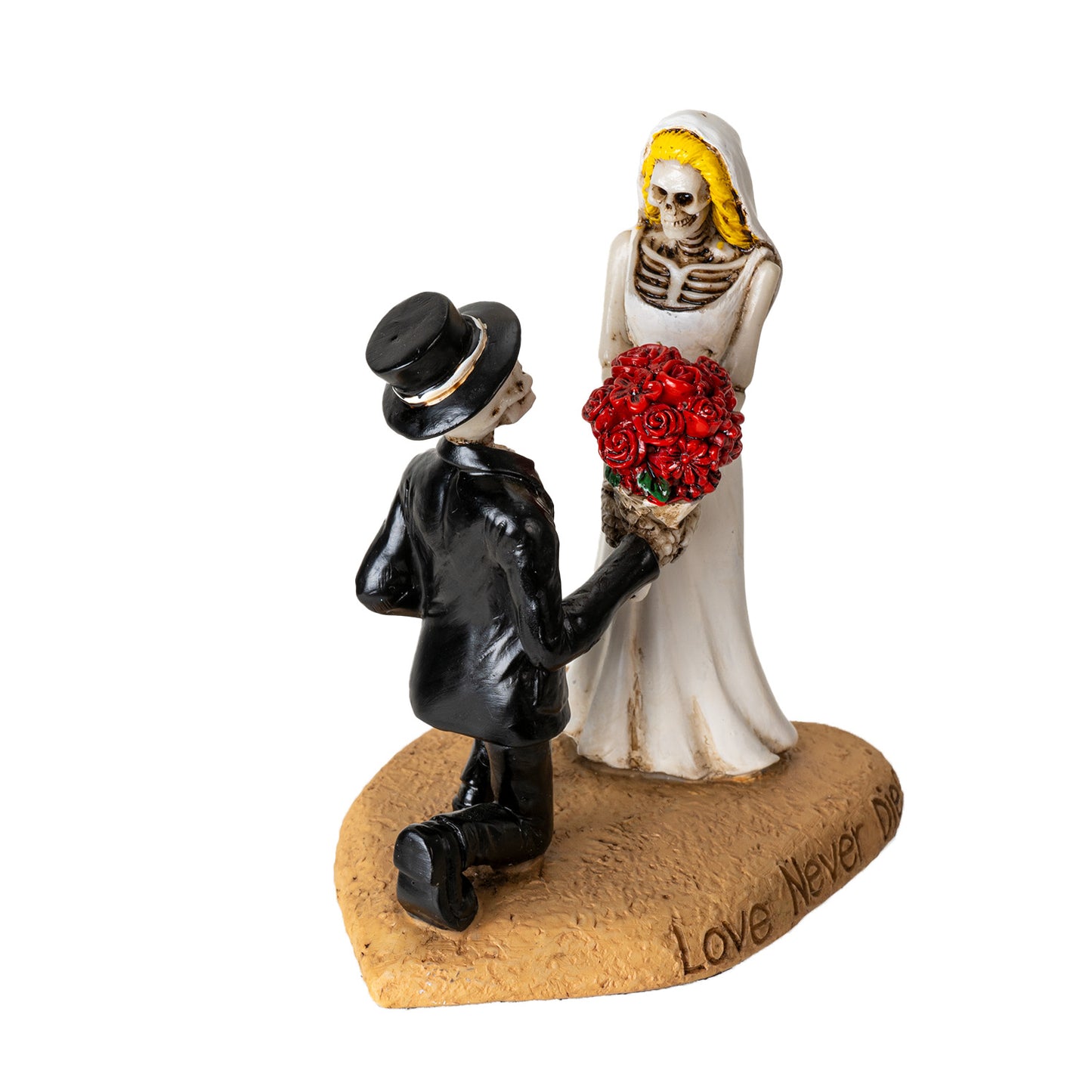 Back angled view of skeleton bride and groom figurine showing details of dress and suit

