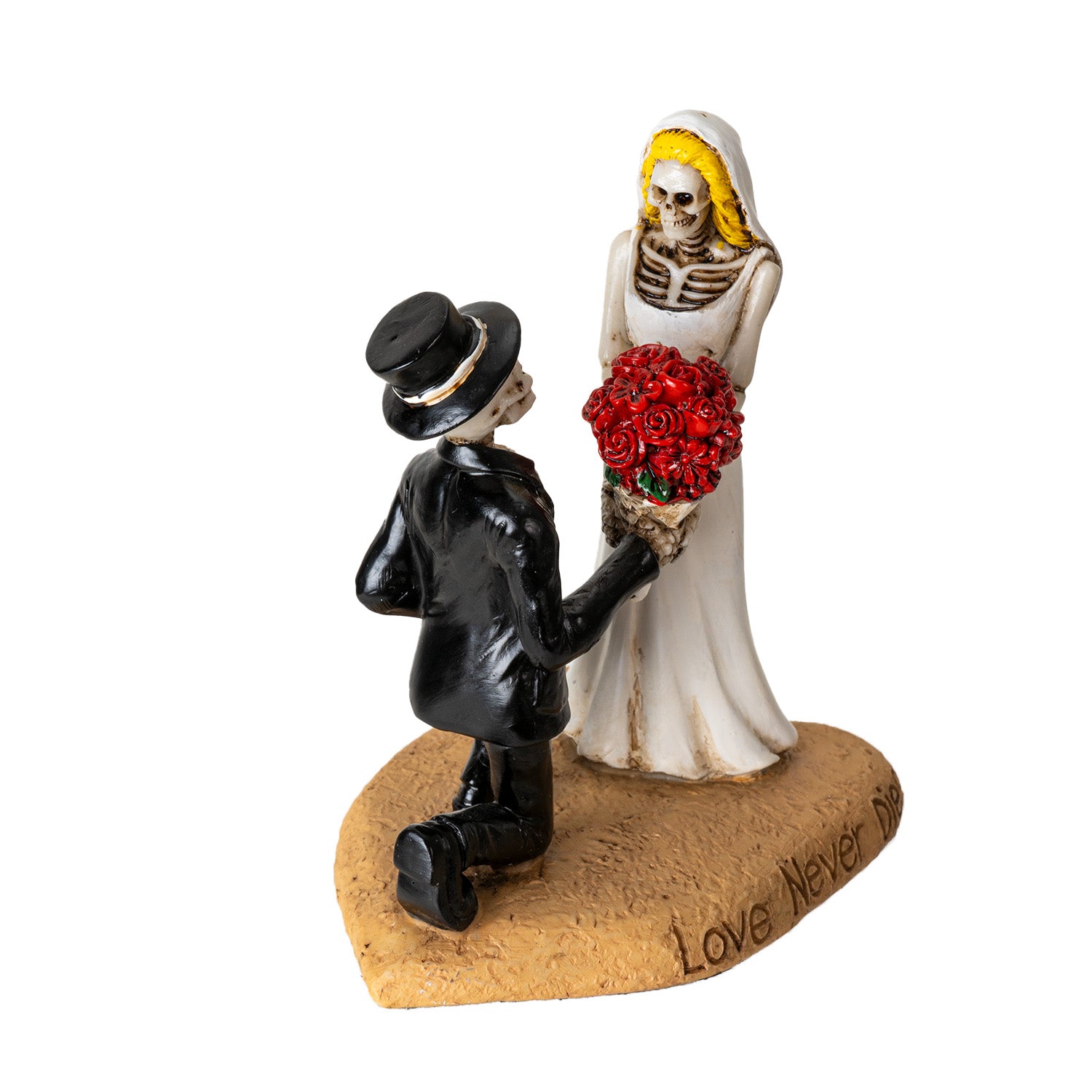 Back angled view of skeleton bride and groom figurine showing details of dress and suit
