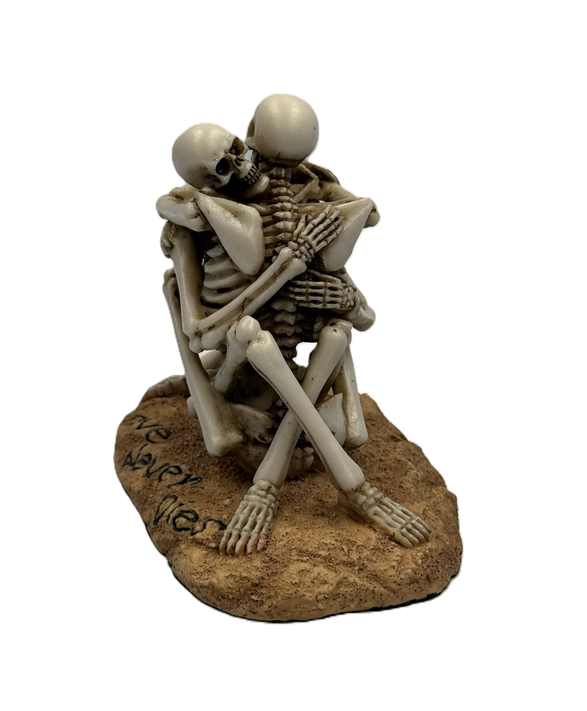 Back angled view of skeleton couple hugging showing detailed bones and romantic gothic pose
