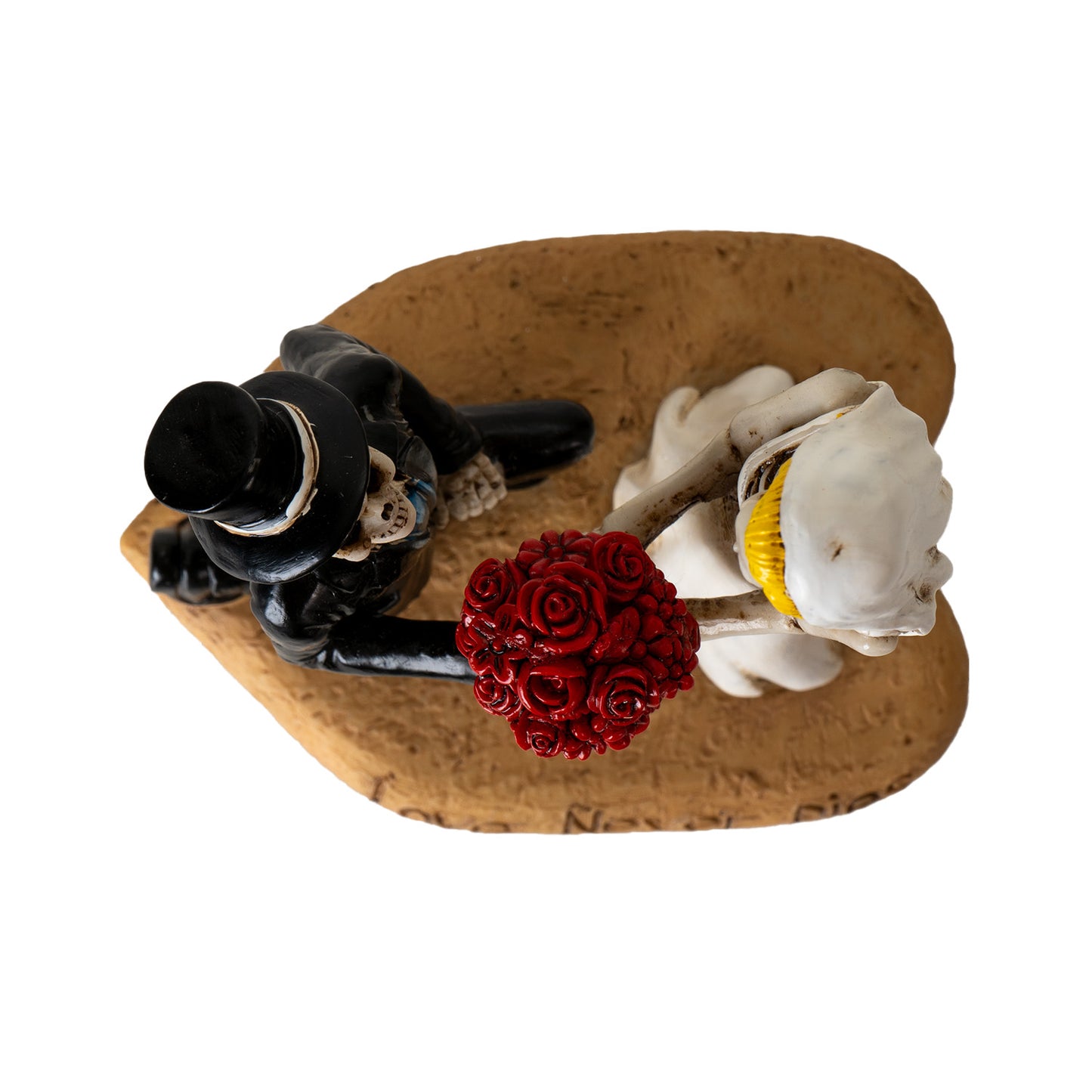 Top view of skeleton couple statue highlighting red rose bouquet and positioning
