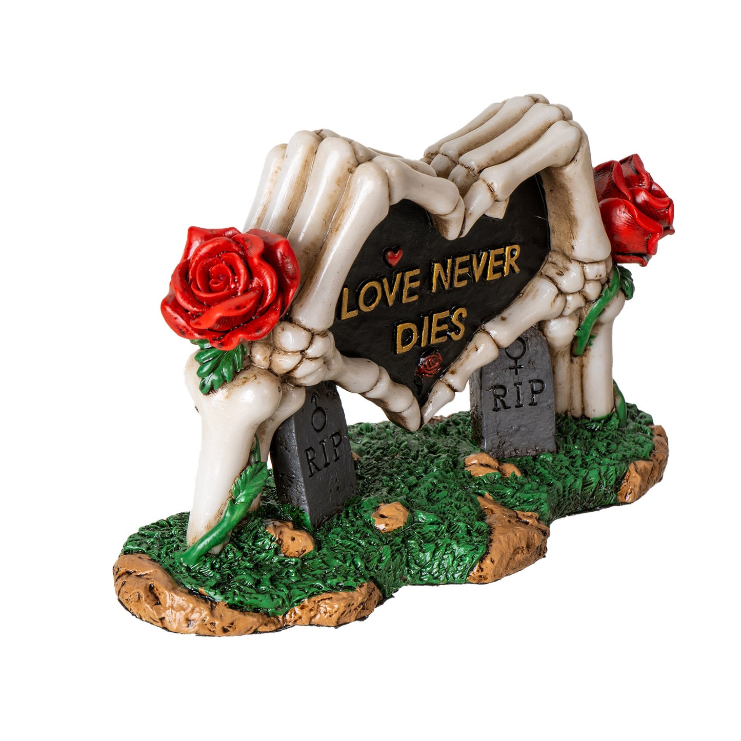 Side angle view of gothic skeleton hands heart statue with tombstones and roses
