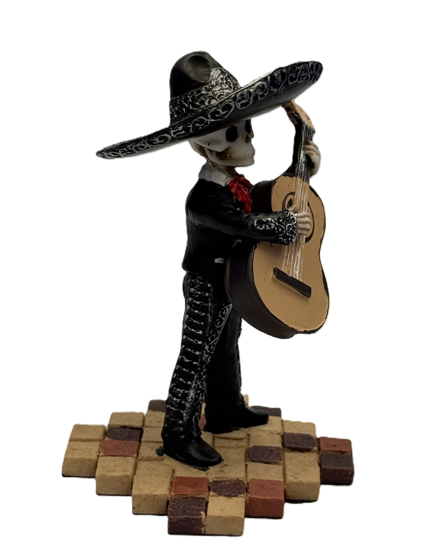 Angled view of Day of the Dead skeleton bass guitarist statue showing intricate details and pose resin
