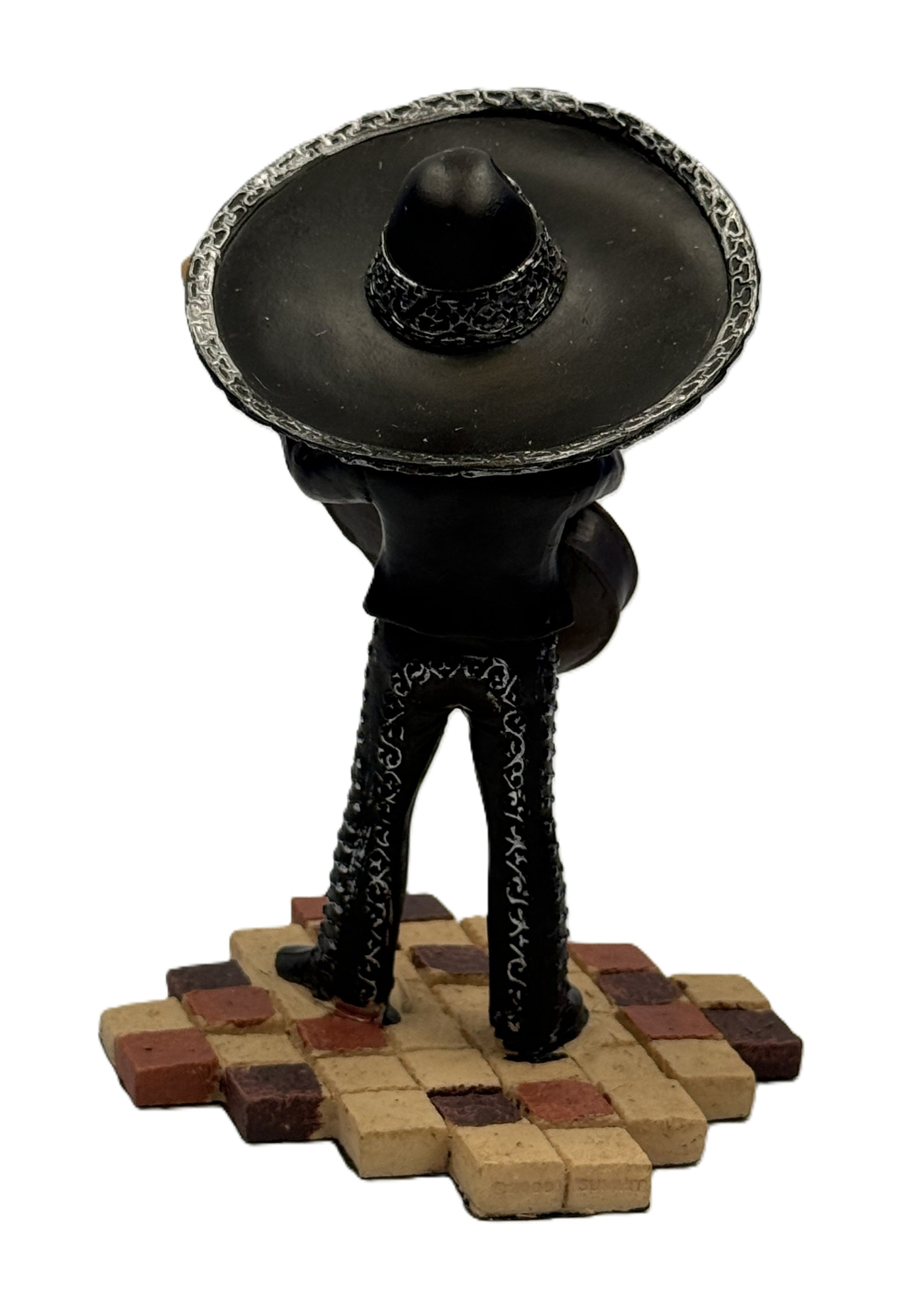 Back view of mariachi skeleton bass guitar figurine showing sombrero and outfit detailing resin statue
