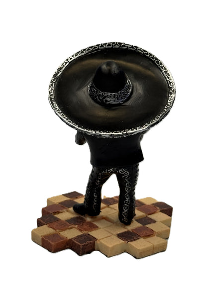 Back view of mariachi skeleton figurine highlighting sombrero and outfit details cold cast resin statue
