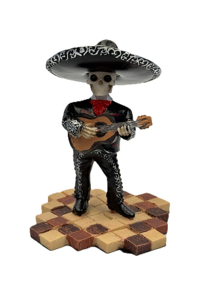 Front view of Day of the Dead mariachi skeleton figurine playing guitar in black outfit with sombrero cold cast resin statue
