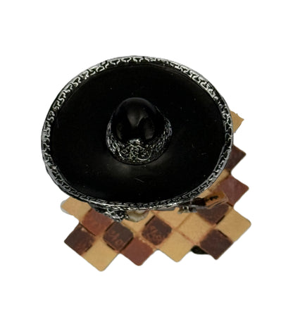 Top view of mariachi skeleton guitar figurine showing sombrero and tiled base cold cast resin statue
