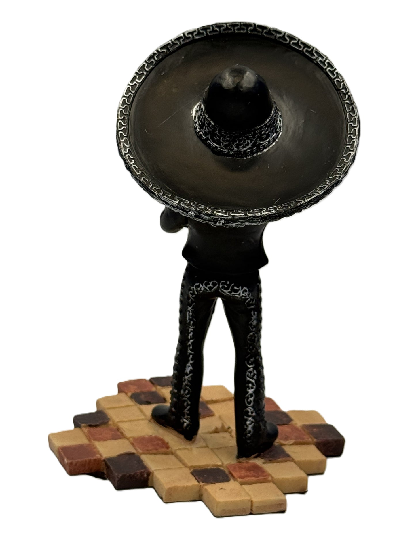 Back view of mariachi skeleton trumpet figurine showing sombrero and outfit detailing cold cast resin statue
