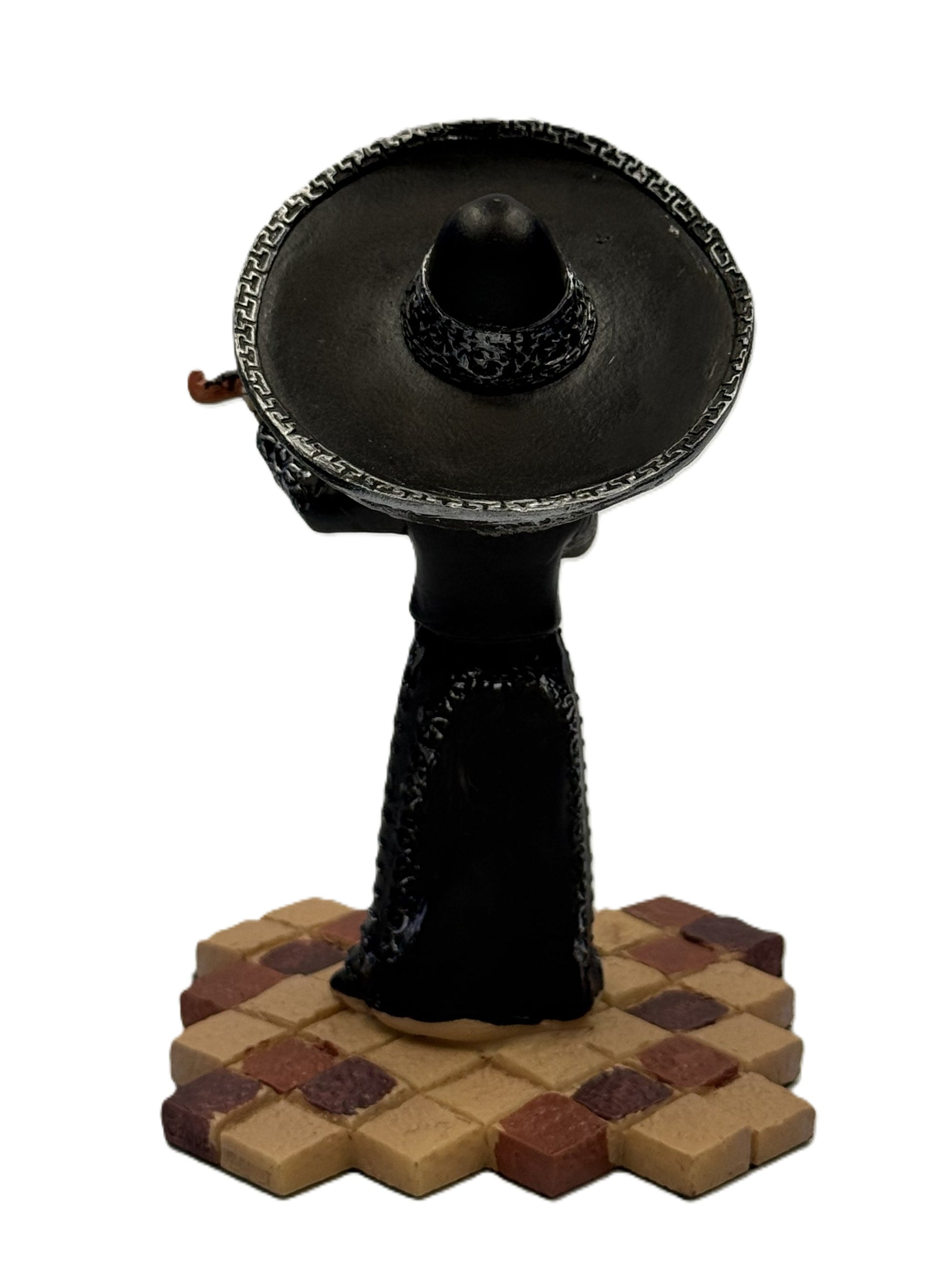 Back view of mariachi skeleton figurine in black dress highlighting sombrero and sculpted details

