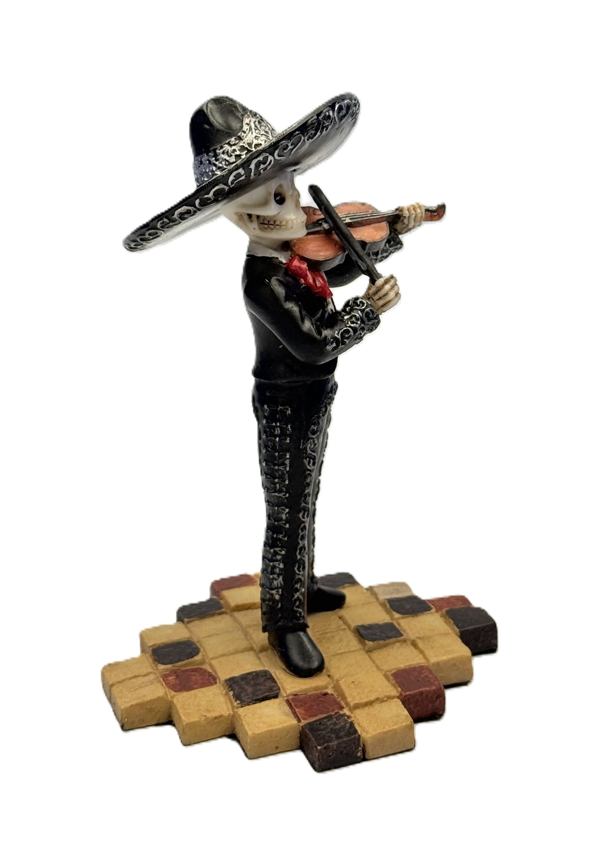 Side profile of Day of the Dead skeleton violinist statue with detailed outfit and pose
