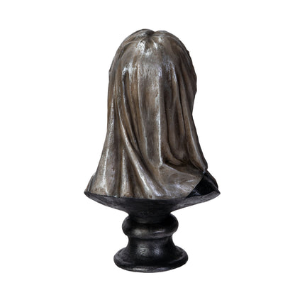 Back view of skull bust covered in flowing veil texture
