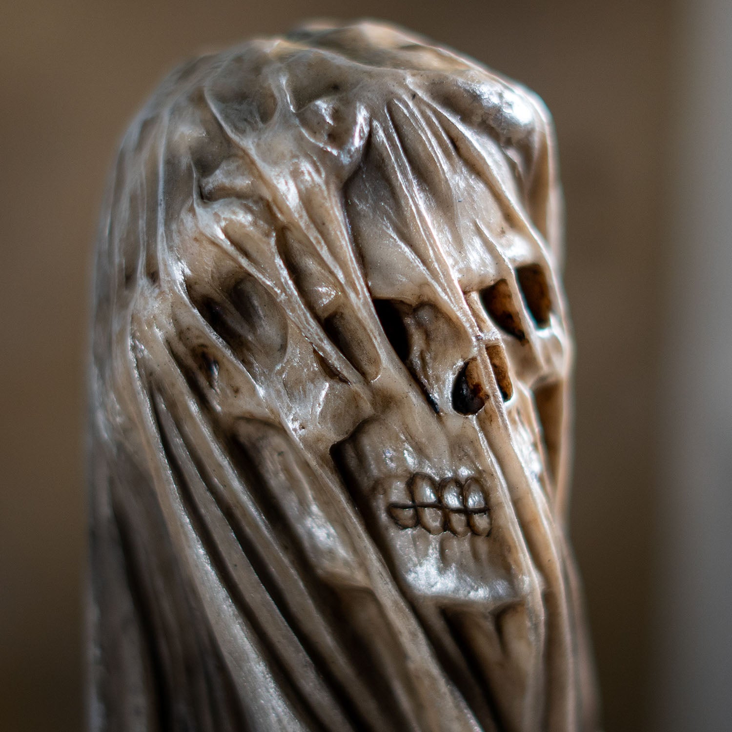 Close up of skull face under veil showing detailed bone features

