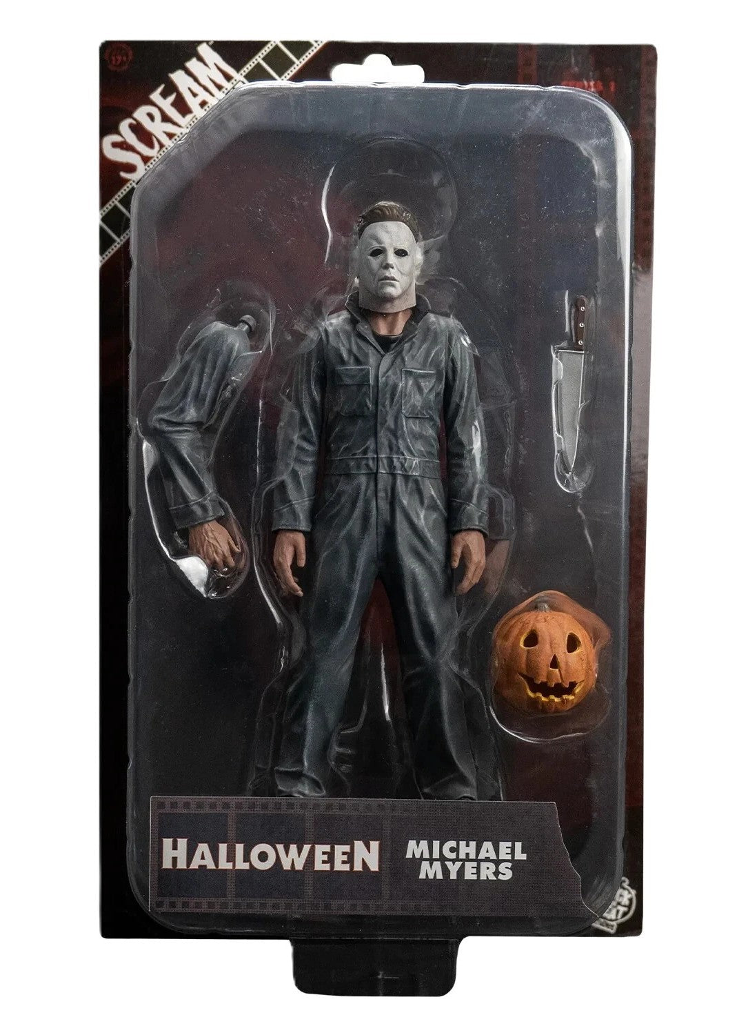 Front view of Halloween 1978 Michael Myers figure in packaging with knife and pumpkin accessory
