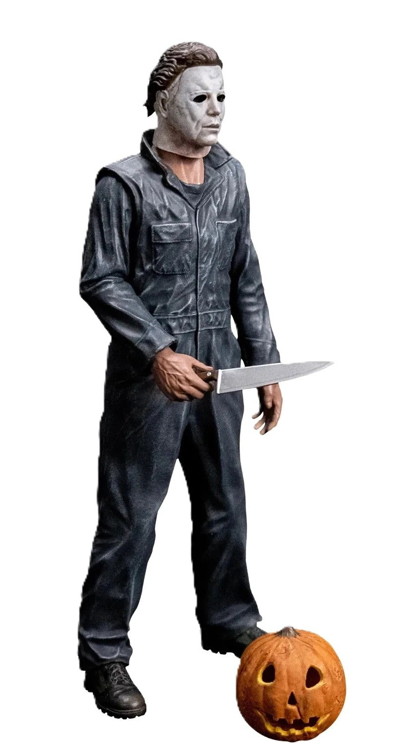 Side angle of Michael Myers figure highlighting mask and coveralls detail
