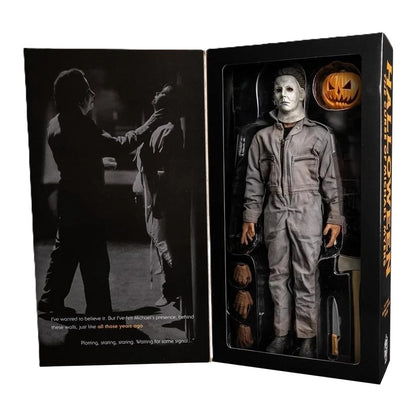 Open box display showing figure and included accessories arranged inside packaging
