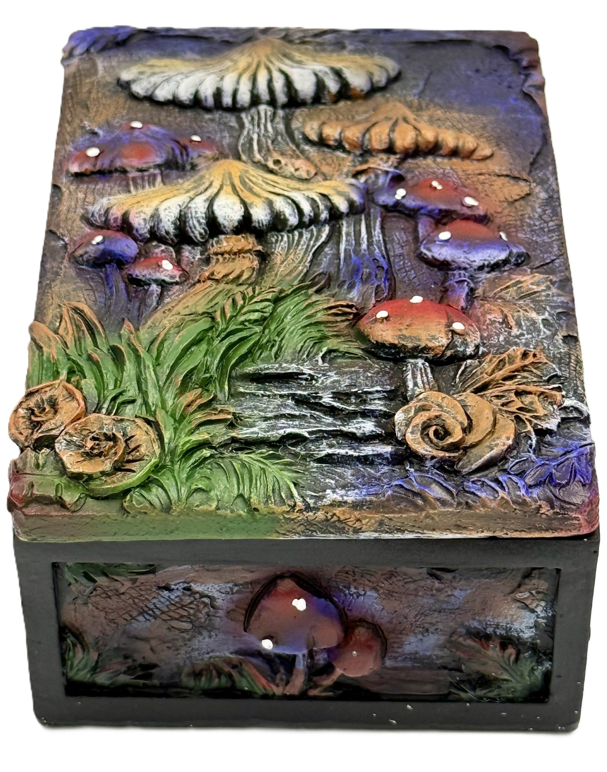Front view of mushroom garden box with colorful forest scene and textured details
