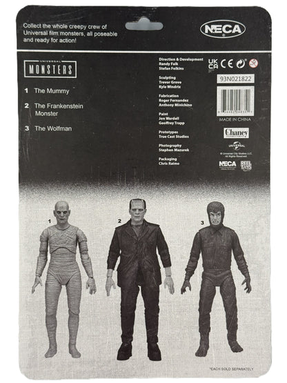 NECA The Wolfman figure back showing Universal Monsters lineup including Mummy and Frankenstein
