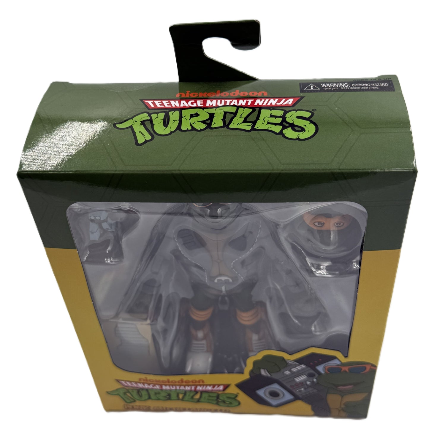 Top angled view of the Nickelodeon Teenage Mutant Ninja Turtles Punk Michelangelo action figure in original packaging.