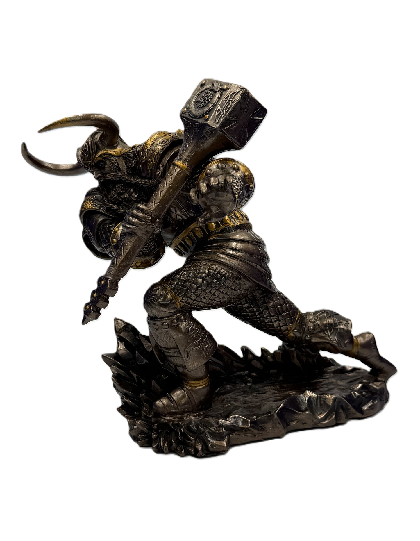 Front view of Norse warrior statue holding large hammer in battle stance with detailed armor
