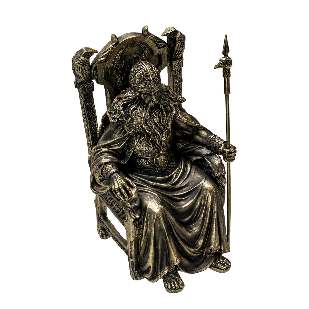 Left angle view of Viking Odin statue with spear and ornate throne
