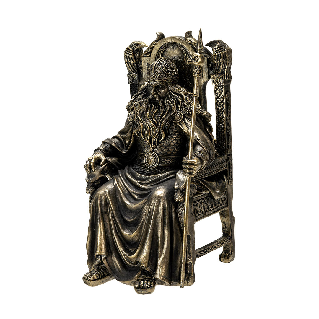 Right angle view of Odin figurine showing ravens and armor details
