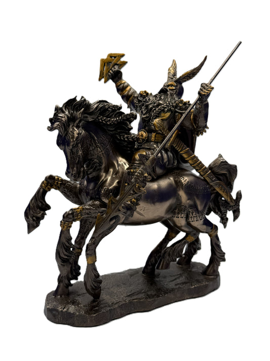 Front left view of Odin Norse god statue riding a horse holding spear and runic symbols in cold cast bronze finish
