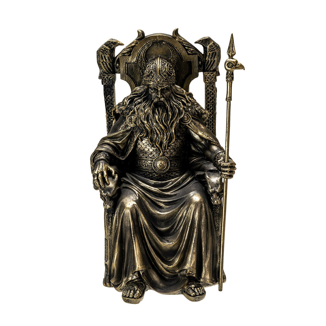 Front view of Odin the Allfather statue seated on throne with spear and ravens
