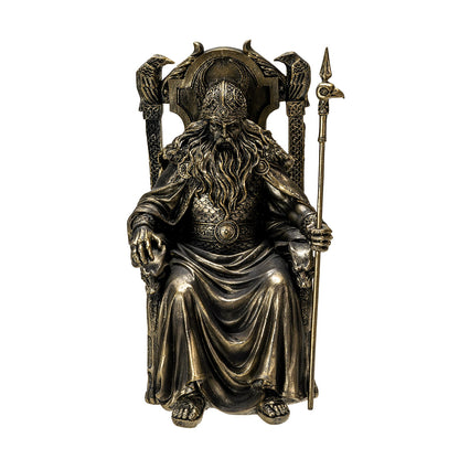 Front view of Odin the Allfather statue seated on throne with spear and ravens
