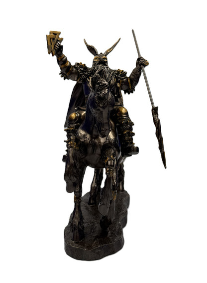 Front view of Odin Norse deity statue emphasizing helmet, beard, and mounted pose
