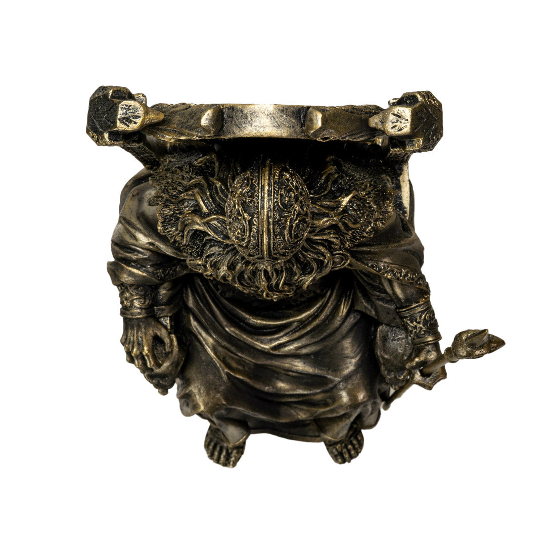 Top view of Norse Odin figurine highlighting helmet and throne details
