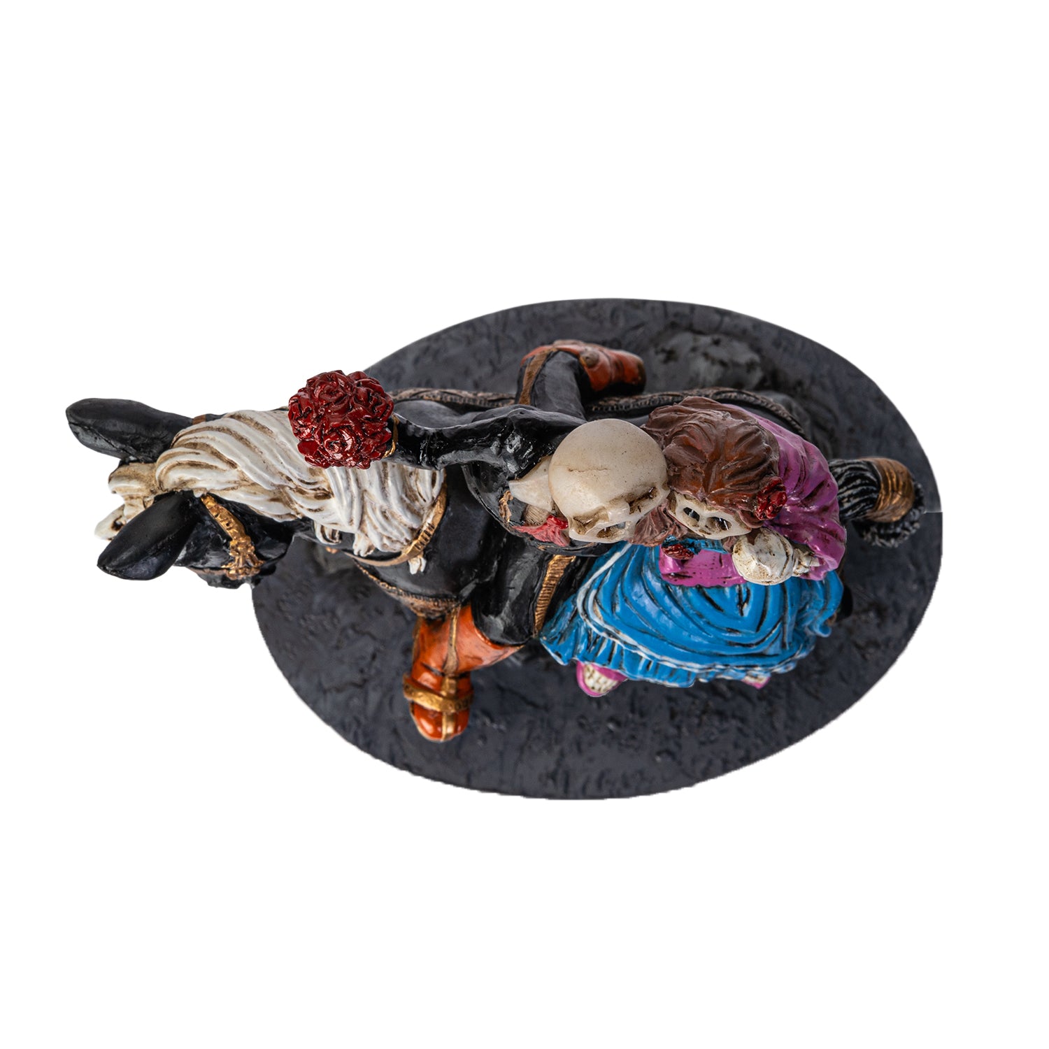 Top view of skeleton couple figurine on horse with bouquet
