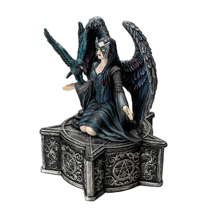 Side view of gothic fairy trinket box showing layered wing texture and base details
