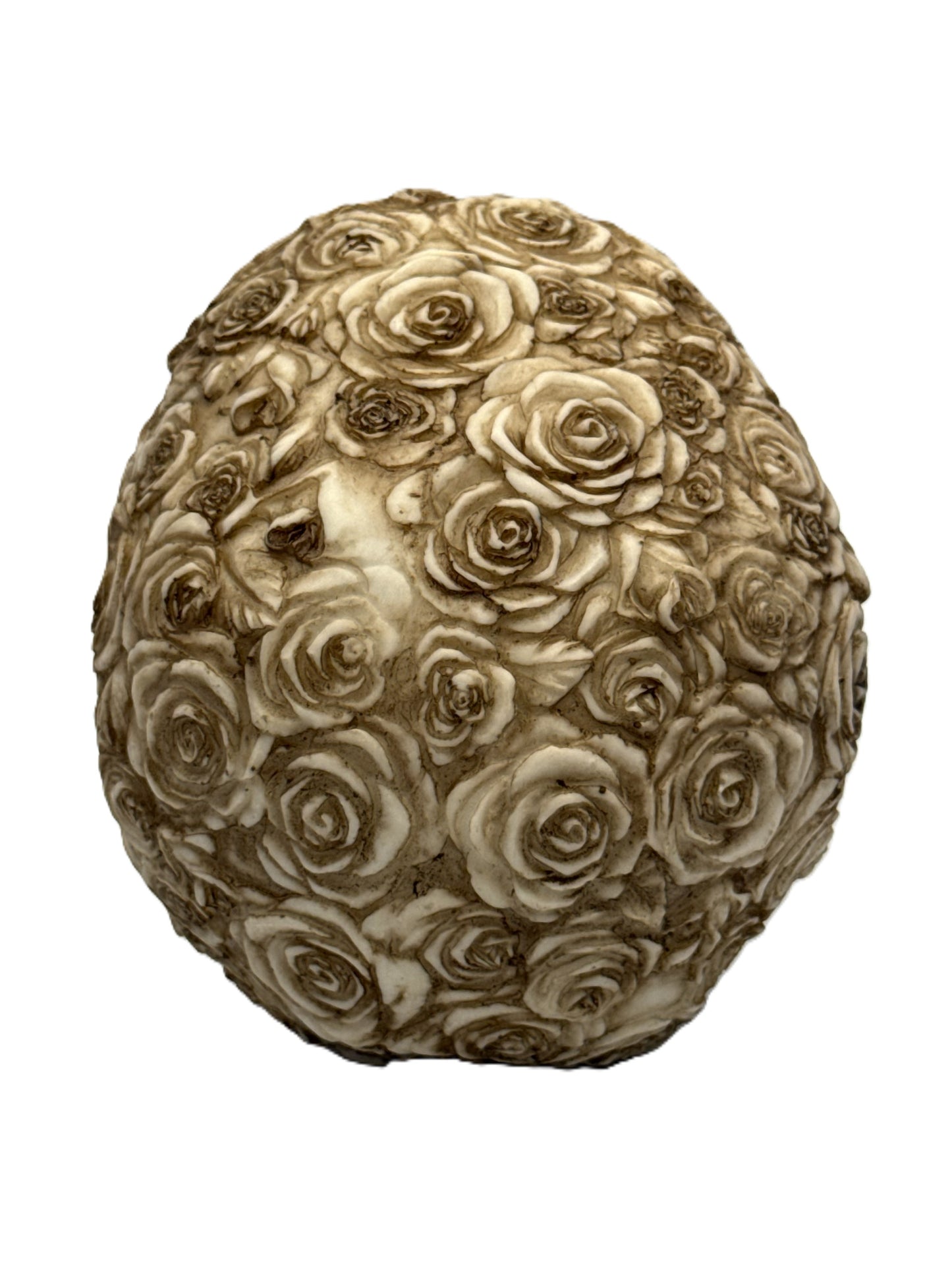 Back view of rose skull statue fully covered in sculpted roses with intricate detailing

