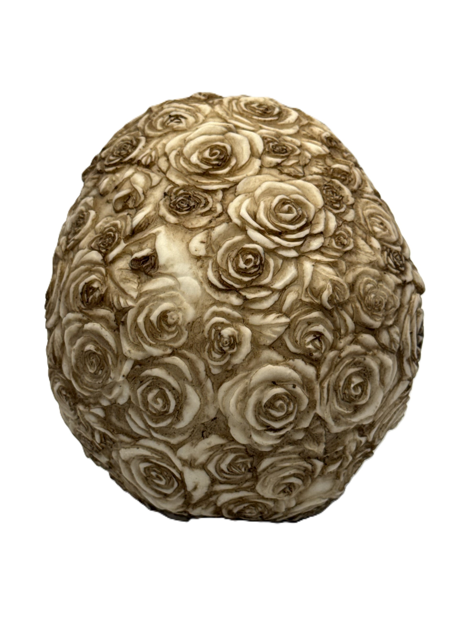 Back view of rose skull statue fully covered in sculpted roses with intricate detailing
