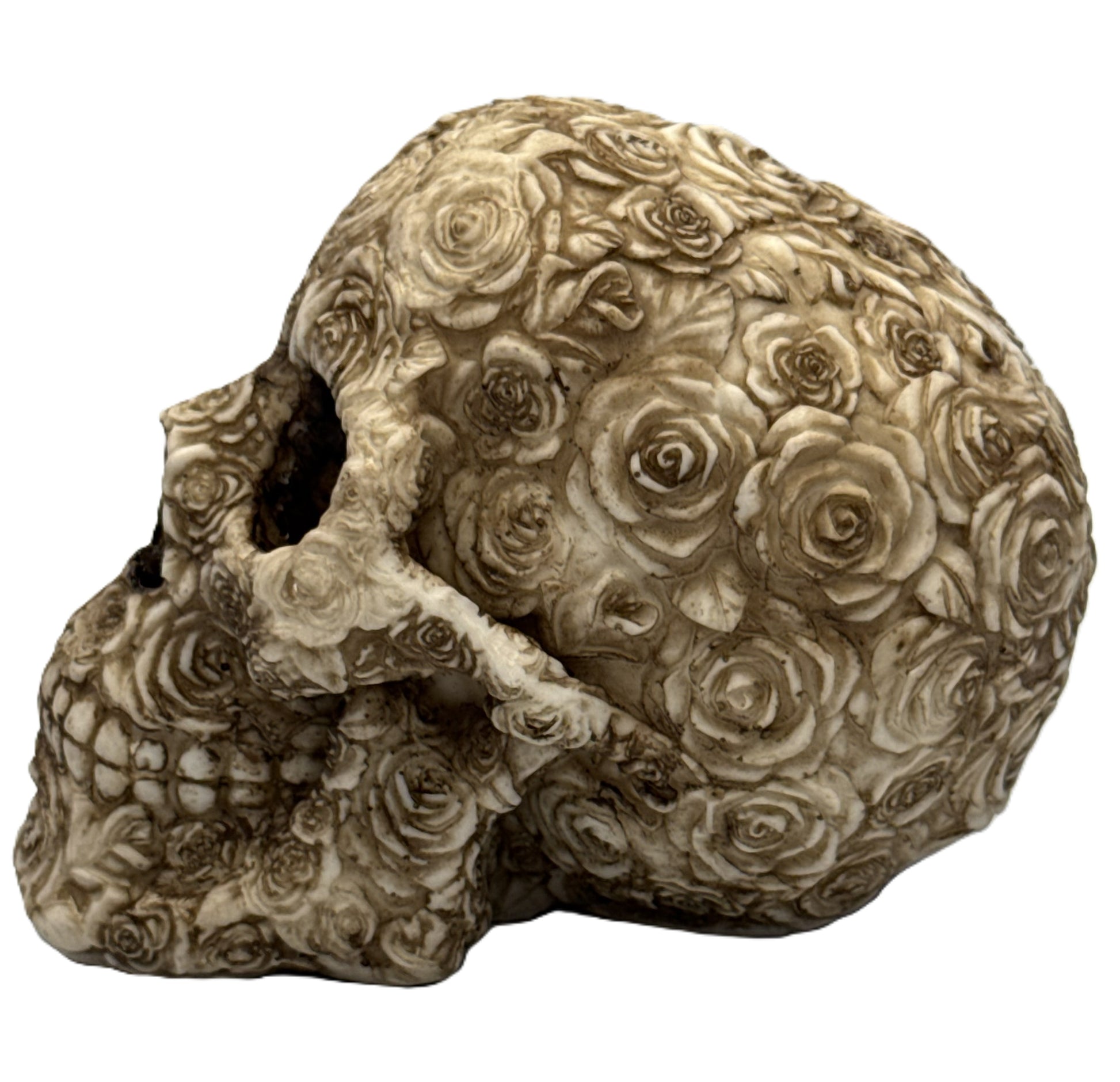 Left side view of floral skull decor showing layered rose patterns and textured resin surface
