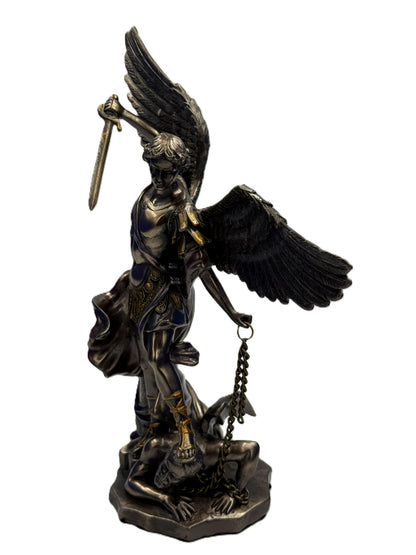 Angled view of Saint Michael Archangel figurine showing wings and detailed armor

