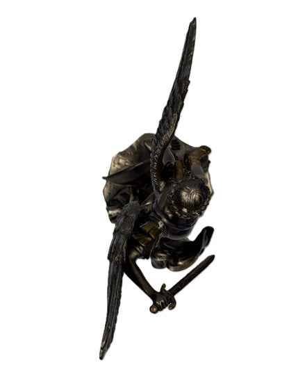 Top view of Saint Michael Archangel statue showing sword and wing positioning
