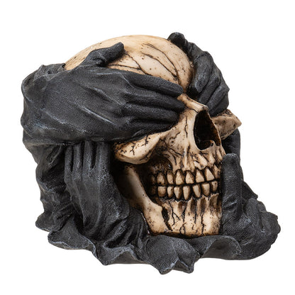 Side view emphasizing sculpted fingers and skull contours
