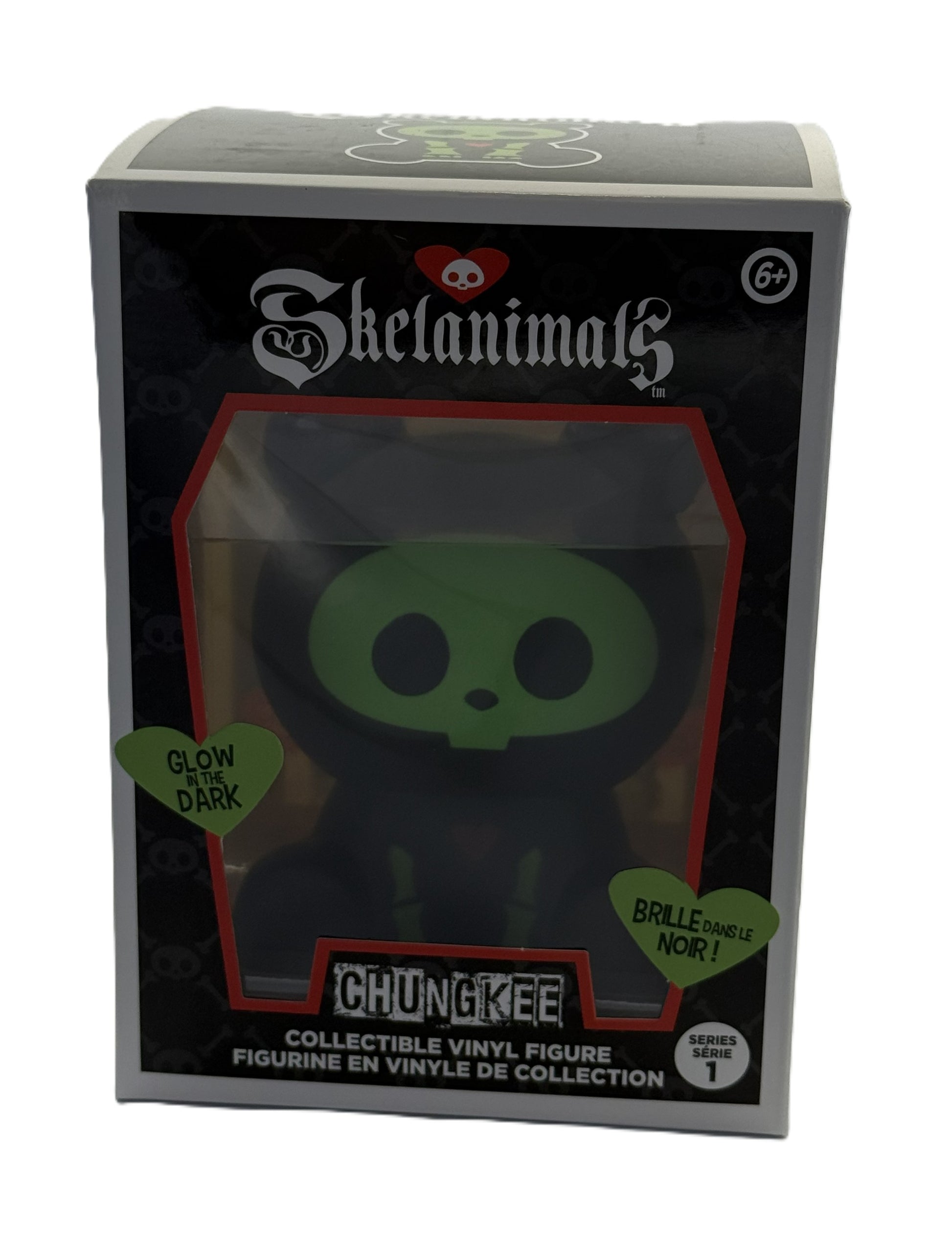Front view of Skelanimals Chungkee vinyl figure packaging showing glow in the dark panda design in window box
