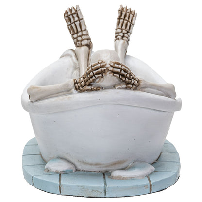 Back view showing skeleton reclining in tub with raised legs and detailed base
