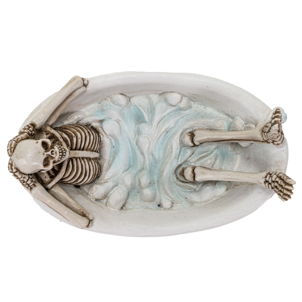 Top view showing skeleton inside bathtub with sculpted water effect and bone detail
