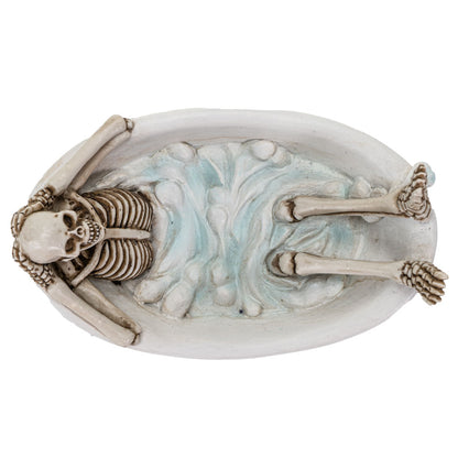Top view showing skeleton inside bathtub with sculpted water effect and bone detail
