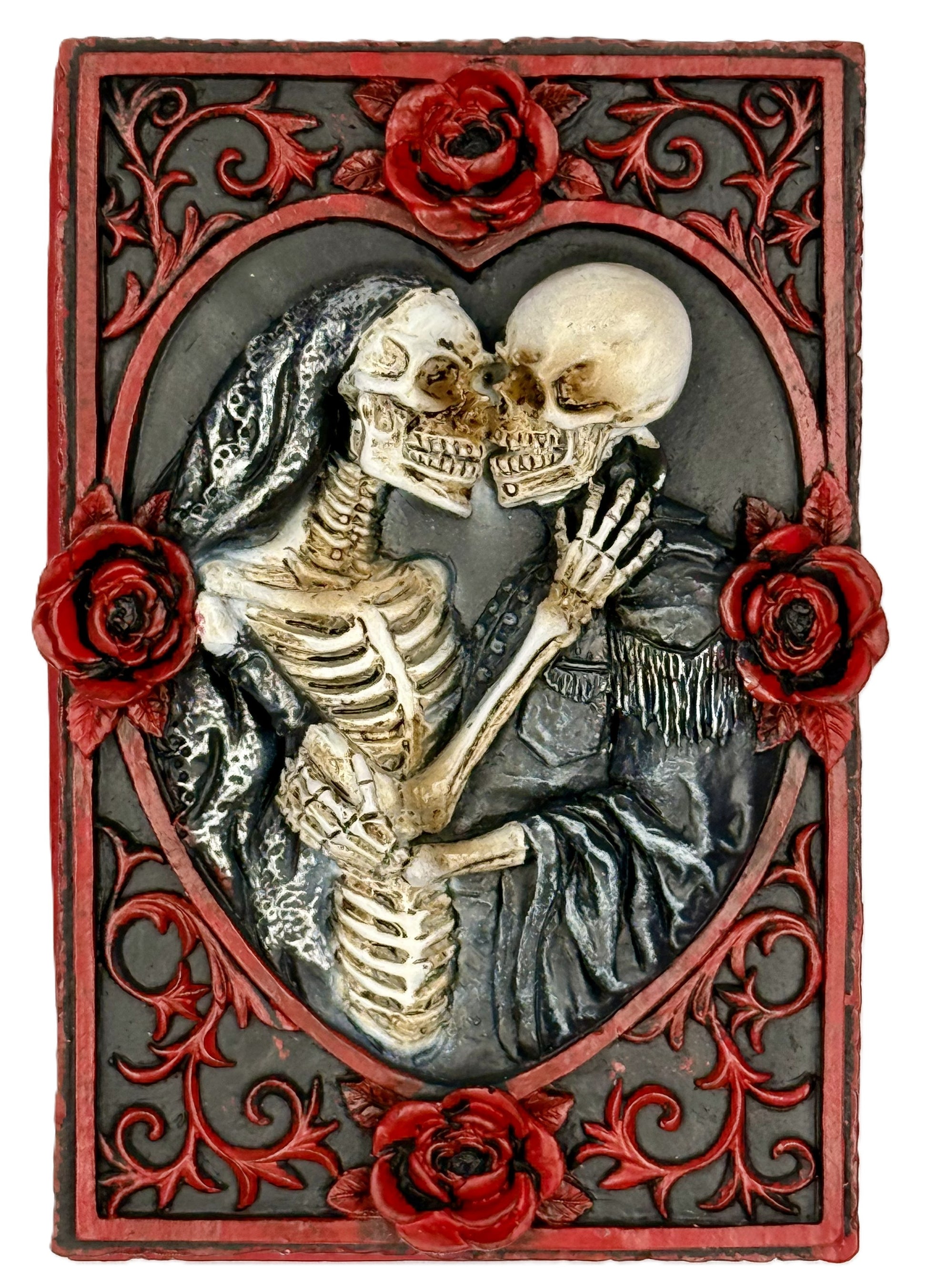 Top view highlighting detailed skull faces and gothic floral border
