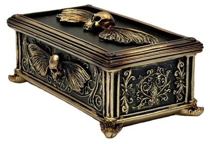 Angled view of gothic skull moth box showing ornate side details and texture
