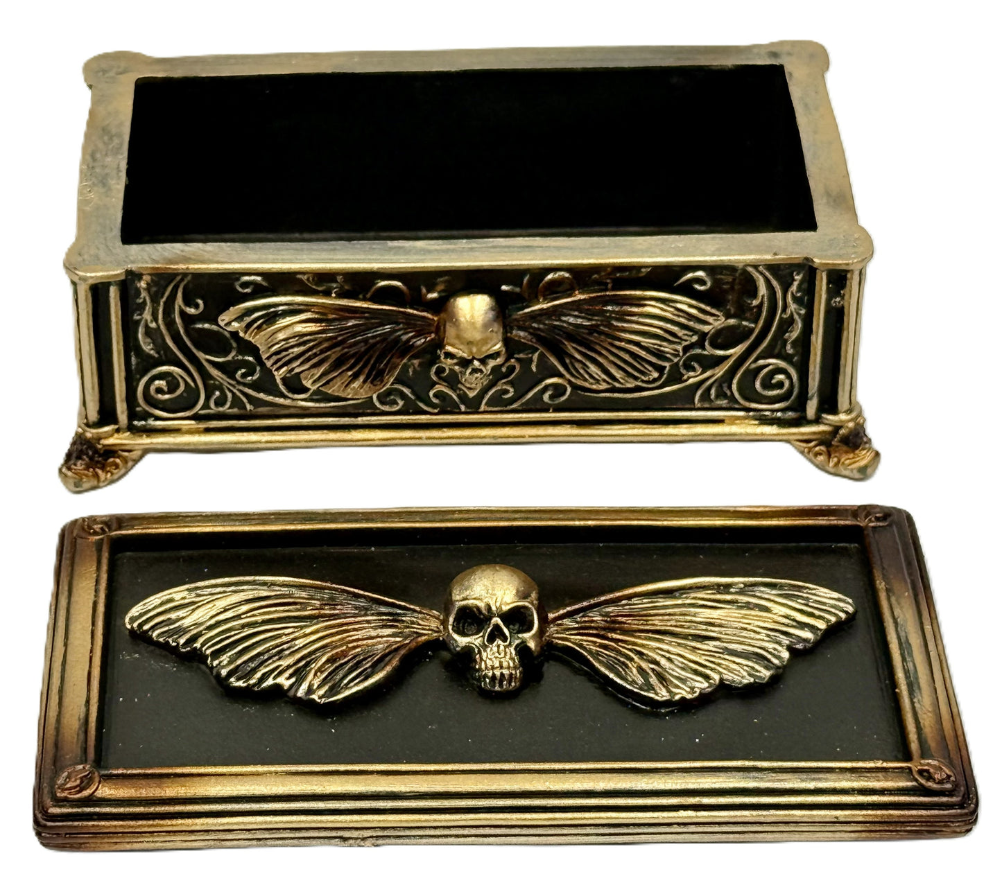 Open view of skull moth trinket box interior and lid design
