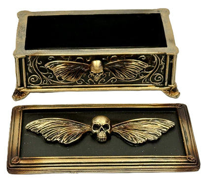 Open view of skull moth trinket box interior and lid design
