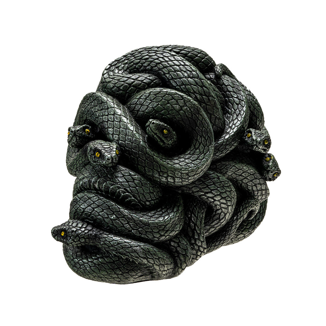 Right angle view of resin snake skull decor showing layered coils
